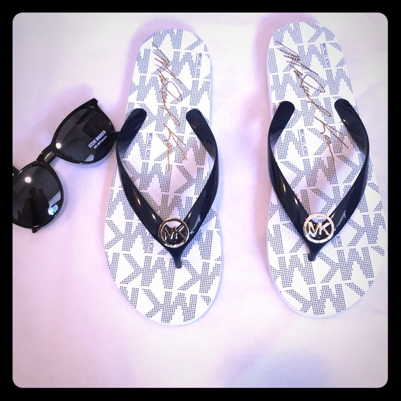 Michael Kors Shoes - NWOB. Michael Kors blue & white flip flops.